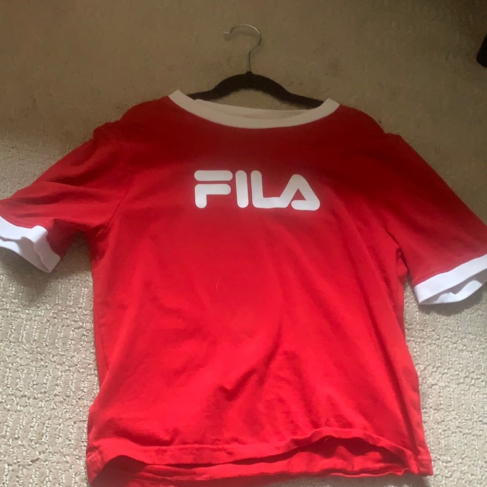 Red T-shirt with white lining and writing